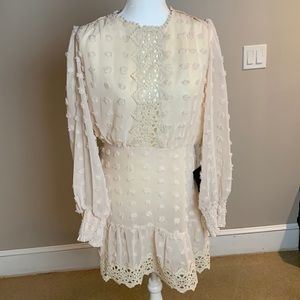 Cream, formal dress with detailing throughout